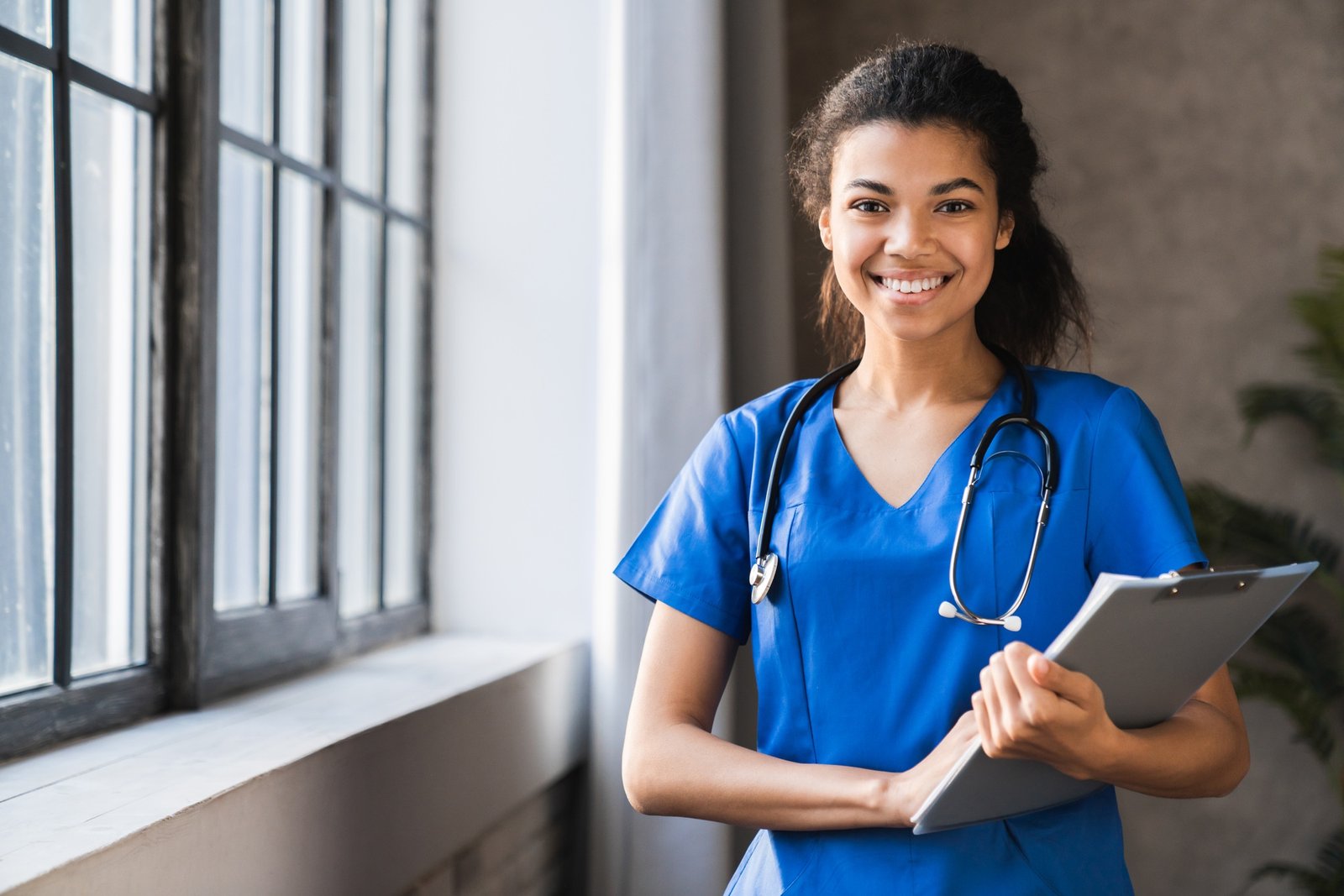 African-american doctor working in hospital , healthcare and medical concept